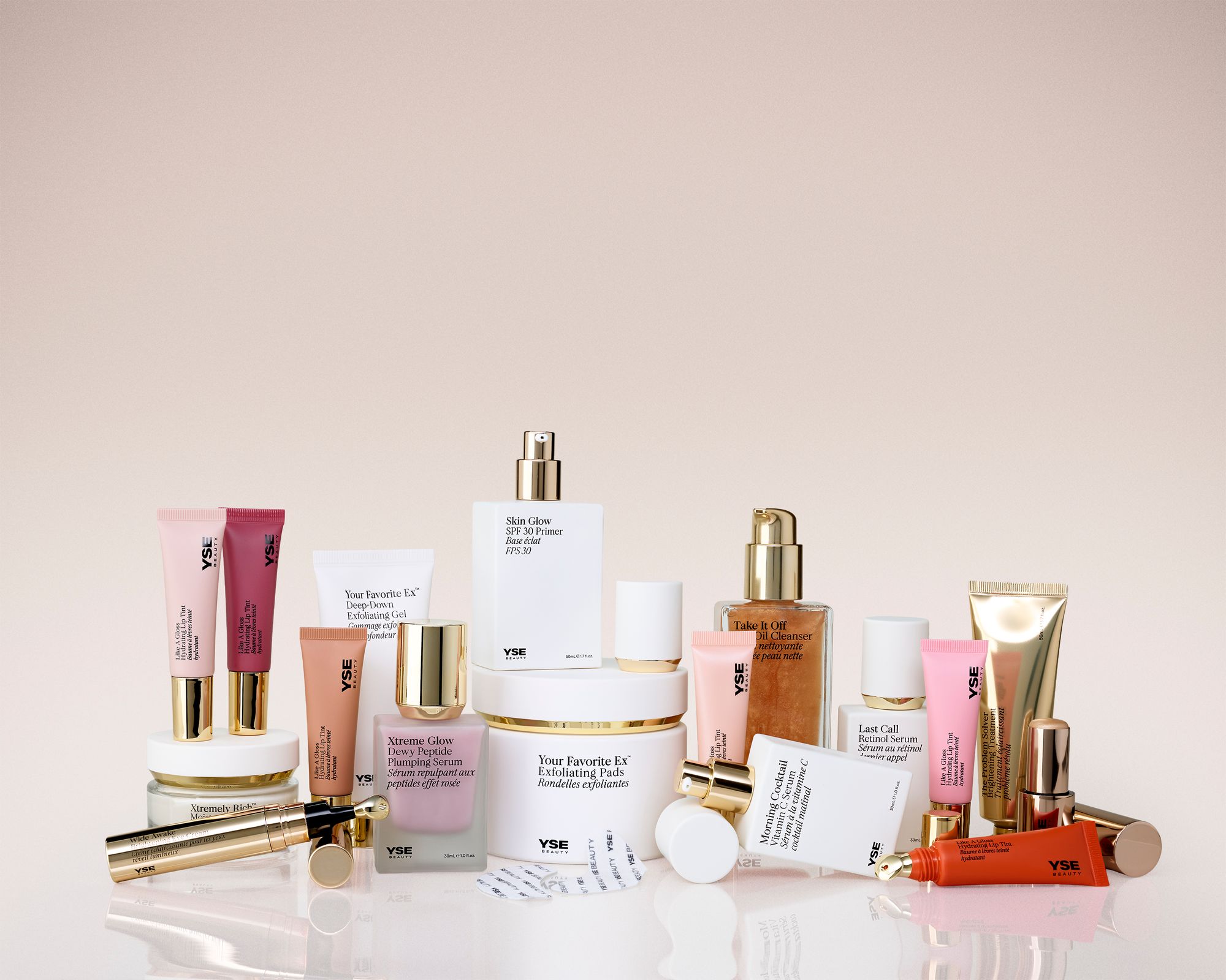 YSE Beauty skincare products arranged on a pink surface